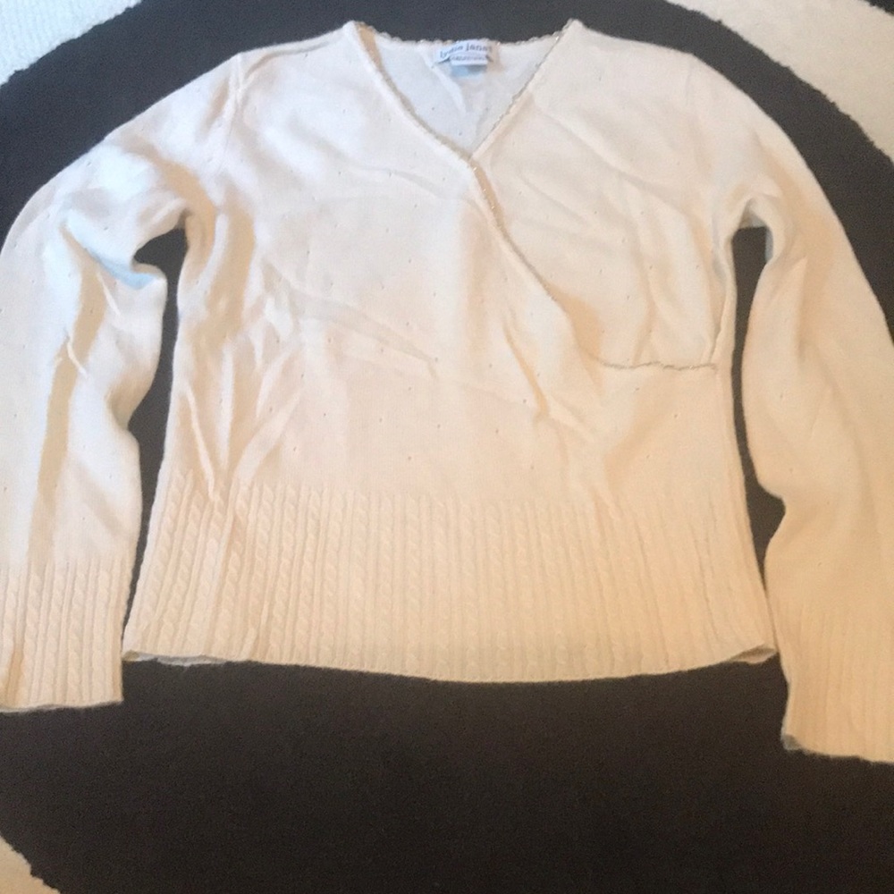 Girls 100% Cashmere sweater with gold trim.